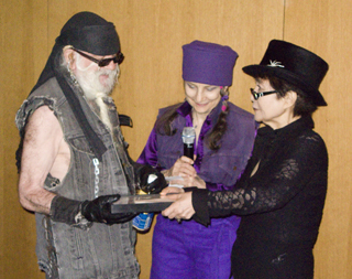 Feb. 1, 2009 - Yoko Ono presents an award of recognition to La Monte Young at an event at the Museum of Modern Art in New York. La Monte Young is an avant garde musician who was a big inspiration for composer John Cale, and many others. Photo by Bob Gruen.